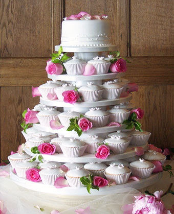 wedding cakes cup cakes Cup cake wedding cake with pink sugar blossoms wedding cakes cup cakes Cup cake wedding cake with pink sugar blossoms